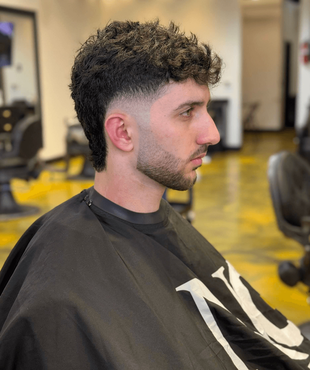 Clean beard line-up and fade